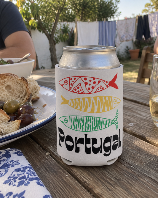 Portugal 3 Sardines White koozy on a wooden picnic table at a backyard lunch
